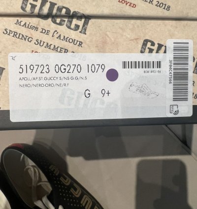 Gucci black gold star sneaker