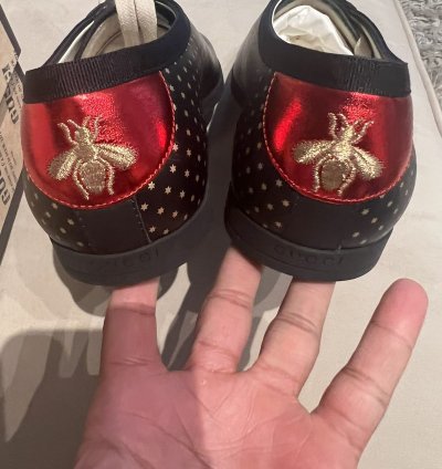 Gucci black gold star sneaker