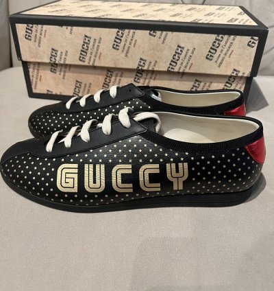 Gucci black gold star sneaker