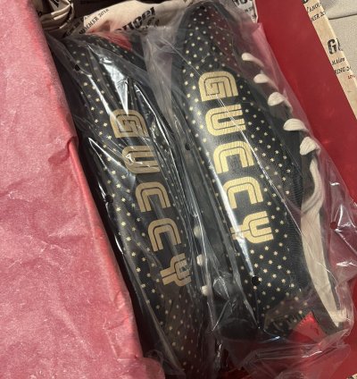 Gucci black gold star sneaker