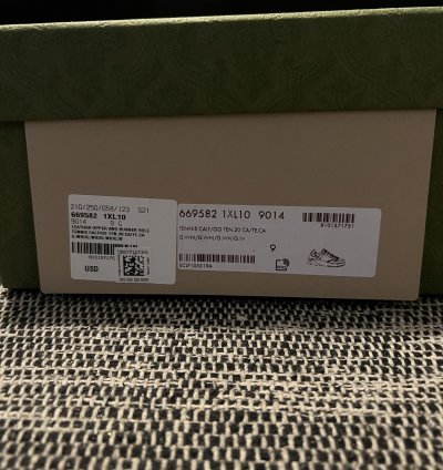 Gucci GG Embossed Sneakers in White