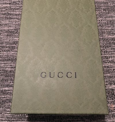 Gucci GG Embossed Sneakers in White