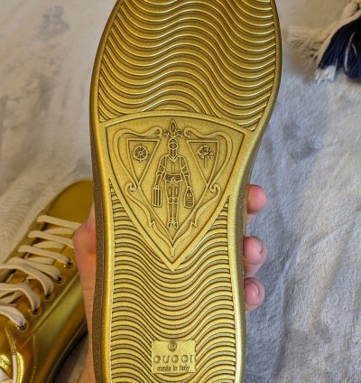 Gucci gold aces