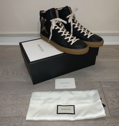 Leather High Donald Duck sneakers by Gucci