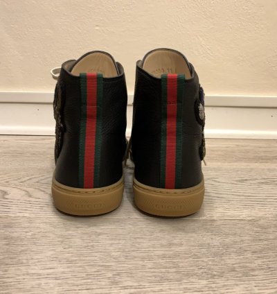Leather High Donald Duck sneakers by Gucci