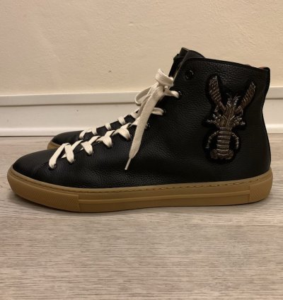 Leather High Donald Duck sneakers by Gucci