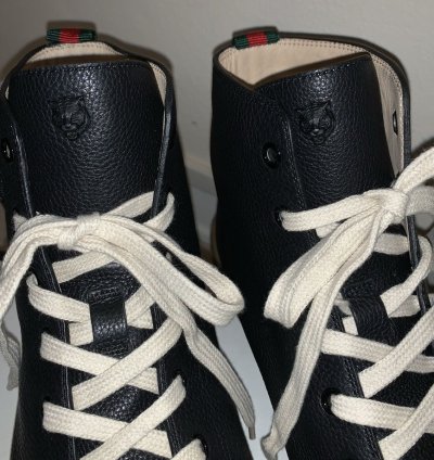 Leather High Donald Duck sneakers by Gucci