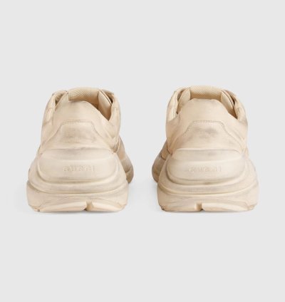 o1s1wg110125 Rhyton Leather Low-Top Sneakers in Beige