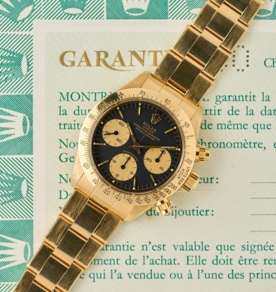 Rolex Daytona 6265 - 18k Yellow Gold - Black Dial - Rolex Punched Warranty