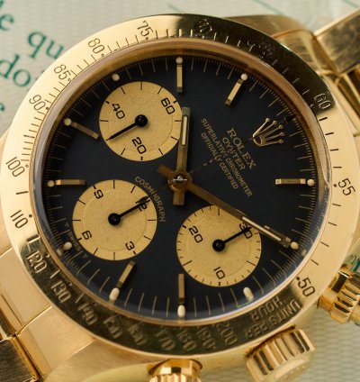 Rolex Daytona 6265 - 18k Yellow Gold - Black Dial - Rolex Punched Warranty