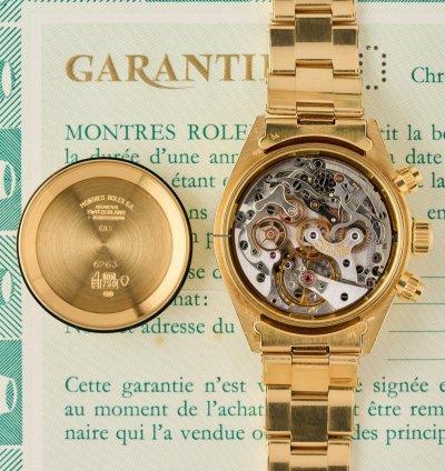 Rolex Daytona 6265 - 18k Yellow Gold - Black Dial - Rolex Punched Warranty