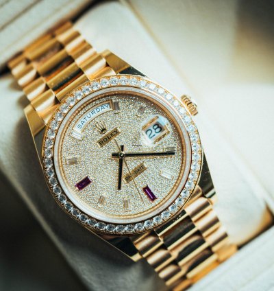 Rolex Day-date 40 With Pave Diamond Dial With 2 Ruby Baguettes 18k Yellow Gold