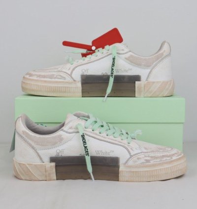 Low Vulcanized Distressed Sneakers In White Navy Blue