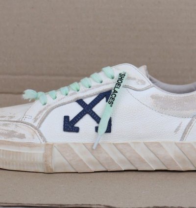 Low Vulcanized Distressed Sneakers In White Navy Blue