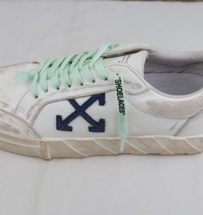 Low Vulcanized Distressed Sneakers In White Navy Blue