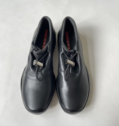 1999 Bunjee Cord Leather Sneakers