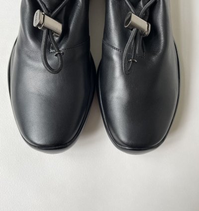 1999 Bunjee Cord Leather Sneakers