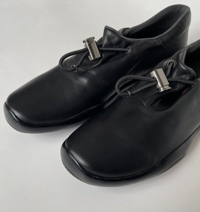 1999 Bunjee Cord Leather Sneakers