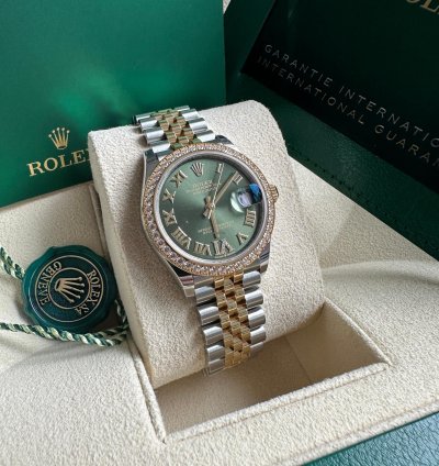 Rolex Datejust 31 2023 Two Tone Yellow Gold Green Roman Dial Diamond Bezel - Jubilee Bracelet