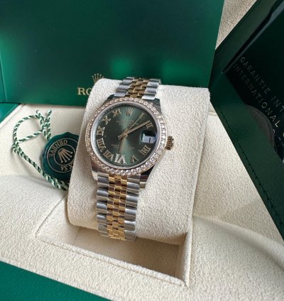 Rolex Datejust 31 2023 Two Tone Yellow Gold Green Roman Dial Diamond Bezel - Jubilee Bracelet