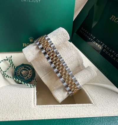 Rolex Datejust 31 2023 Two Tone Yellow Gold Green Roman Dial Diamond Bezel - Jubilee Bracelet