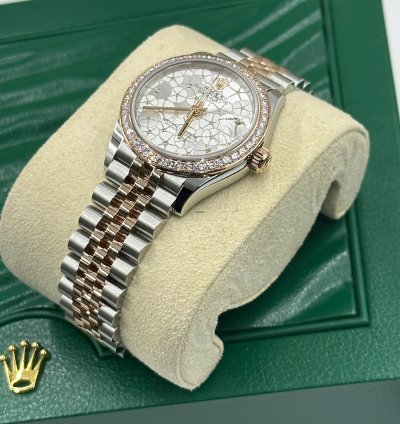 Rolex Datejust 31 Silver Flower Diamond Bezel Jubilee