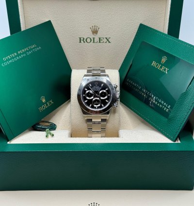 Rolex Daytona 116520 2015 New Old Stock Black Dial Stainless Steel Oyster Bracelet