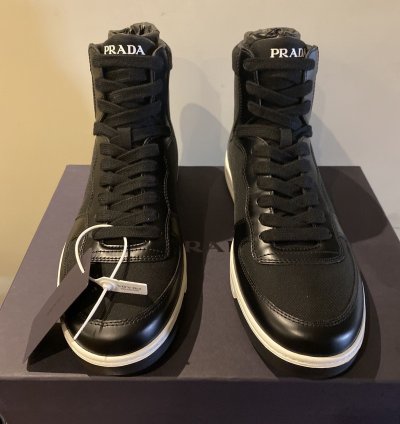 Prada High Top Leather And Nylon Sneakers