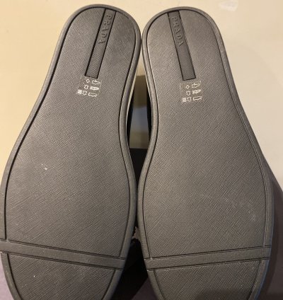 Prada High Top Leather And Nylon Sneakers