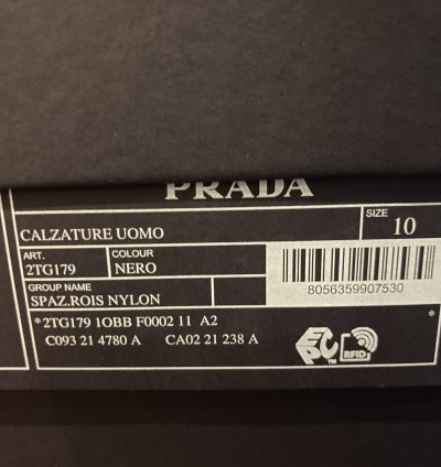 Prada High Top Leather And Nylon Sneakers