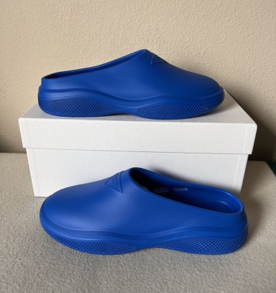 Prada Mellow Rubber Slip Ons In Blue