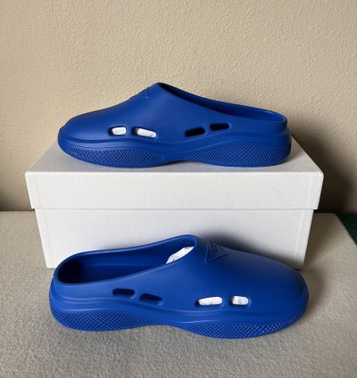 Prada Mellow Rubber Slip Ons In Blue