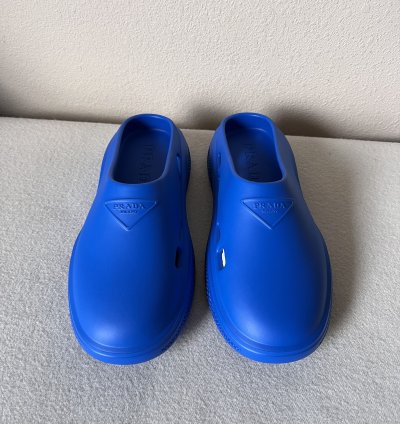 Prada Mellow Rubber Slip Ons In Blue