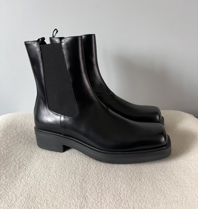 Prada Square Toe Brushed Leather Chelsea Boots In Black