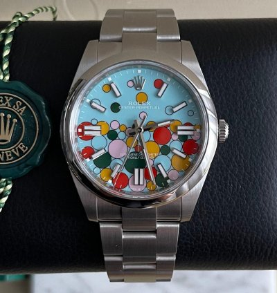 Rolex Oyster Perpetual 41 Bubble Celebration Dial New