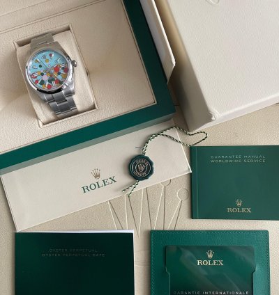 Rolex Oyster Perpetual 41 Bubble Celebration Dial New