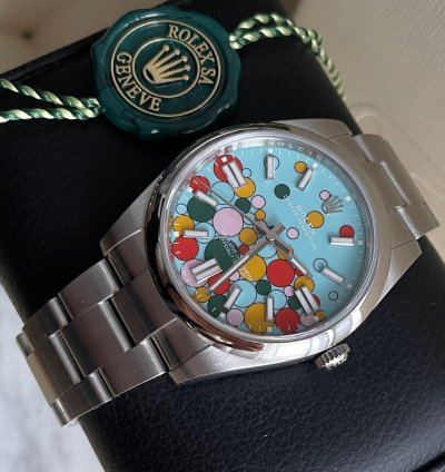 Rolex Oyster Perpetual 41 Bubble Celebration Dial New