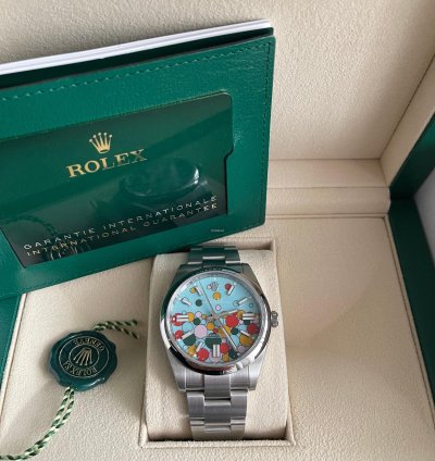 Rolex Oyster Perpetual 41 Bubble Celebration Dial New