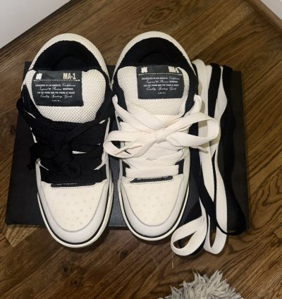 Amiri Ma-1 White And Black Sneaker