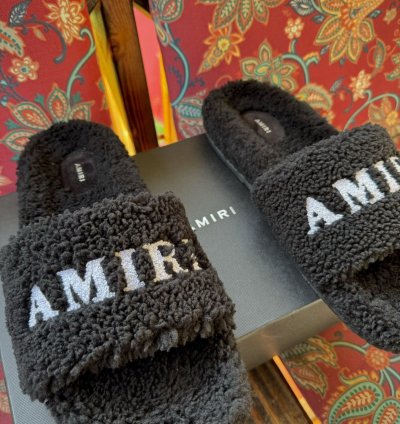 Amiri Sherling Logo Slides