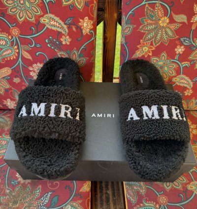 Amiri Sherling Logo Slides