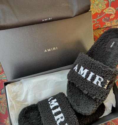 Amiri Sherling Logo Slides
