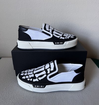Amiri Skel Top Slip Ons In White Black