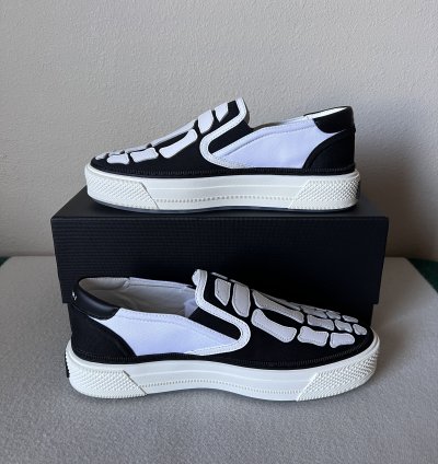 Amiri Skel Top Slip Ons In White Black