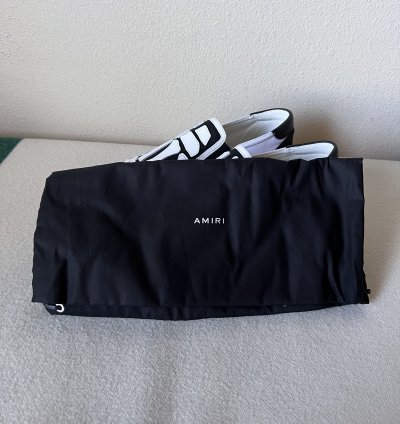 Amiri Skel Top Slip Ons In White Black