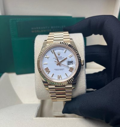 Rolex Day-date 40 Yellow Gold White Roman Dial Fluted Bezel 228238