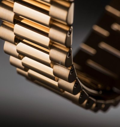 Rolex Day-date 40 Yellow Gold White Roman Dial Fluted Bezel 228238