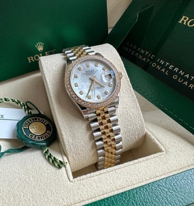 Rolex Datejust 31 2023 Two Tone Yellow Gold Mother Of Pearl Dial Fluted Bezel Jubilee Bracelet