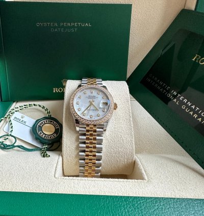 Rolex Datejust 31 2023 Two Tone Yellow Gold Mother Of Pearl Dial Fluted Bezel Jubilee Bracelet