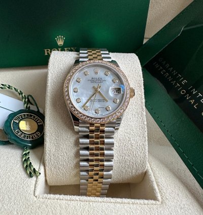 Rolex Datejust 31 2023 Two Tone Yellow Gold Mother Of Pearl Dial Fluted Bezel Jubilee Bracelet